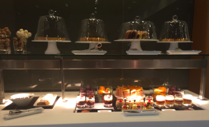 a display of desserts and candles