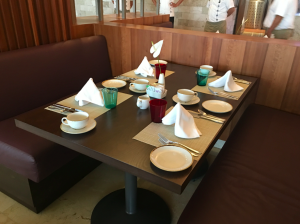 a table with plates and cups on it