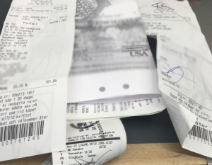 a stack of receipt papers