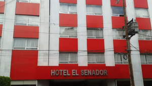 a red and white building with white text