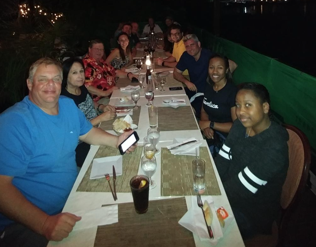 Group pic, at dinner. Photo Credit: Laptop Travel
