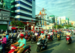 a group of people on motorcycles in a street