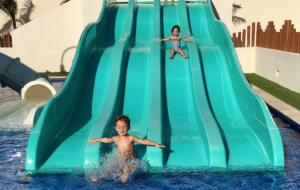 a children on a water slide