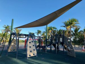 a playground with a shade over it