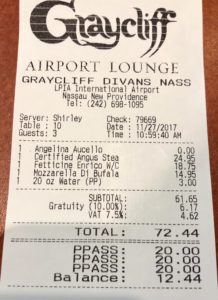 a paper receipt with black text and letters