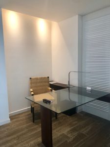 a glass table in a room