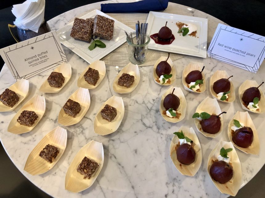 a table with plates of desserts